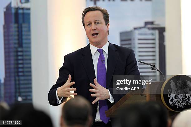 Britain's Prime Minister David Cameron delivers his speech as he visits Al-Ashar University in Jakarta on April 12, 2012. Cameron, who was on a...