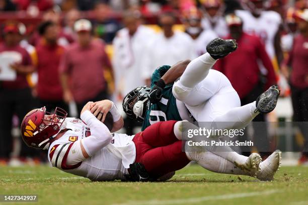 Defensive tackle Javon Hargrave of the Philadelphia Eagles sacks quarterback Carson Wentz of the Washington Commanders during the second half at...