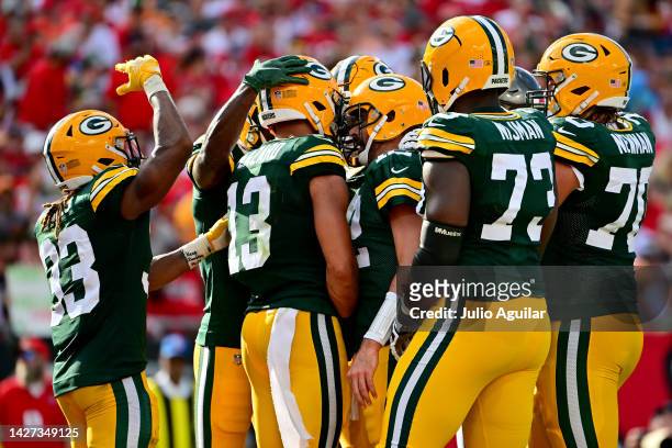 Allen Lazard of the Green Bay Packers celebrates with Aaron Rodgers after scoring a 6 yard touchdown against the Tampa Bay Buccaneers during the...