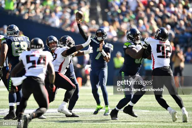 Geno Smith of the Seattle Seahawks passes the ball against the Atlanta Falcons during the first half at Lumen Field on September 25, 2022 in Seattle,...