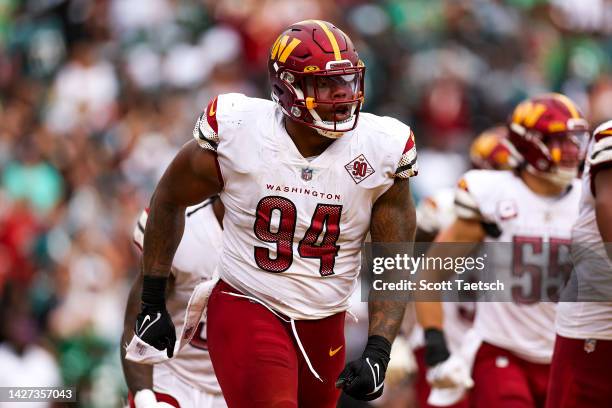 Defensive tackle Daron Payne of the Washington Commanders reacts after recording a safety during the fourth quarter against the Washington Commanders...