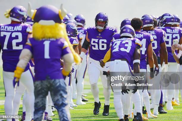 Garrett Bradbury of the Minnesota Vikings during player introductions before the game against the Detroit Lions at U.S. Bank Stadium on September 25,...