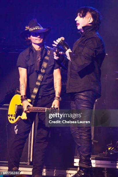 Johnny Depp and Marilyn Manson perform at the 4th annual Revolver Golden Gods awards at Club Nokia on April 11, 2012 in Los Angeles, California.