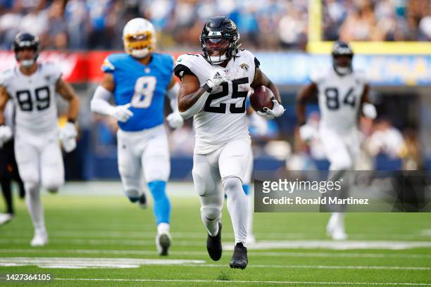 James Robinson of the Jacksonville Jaguars runs for a touchdown during the third quarter against the Los Angeles Chargers at SoFi Stadium on...