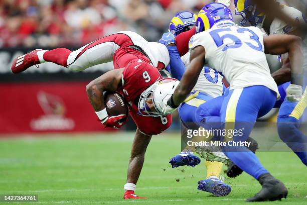 Running back James Conner of the Arizona Cardinals tries to get some extra yards in the second quarter of the game against the Los Angeles Rams at...