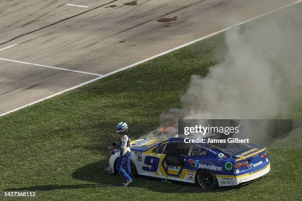 Chase Elliott, exits the NAPA Auto Parts Chevrolet after an on-track incident during the NASCAR Cup Series Auto Trader EchoPark Automotive 500 at...