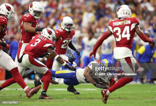Cam Akers of the Los Angeles Rams runs with the ball against the Arizona Cardinals during the third quarter at State Farm Stadium on September 25,...