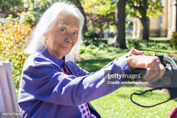 senior elderly filipino woman - autumn 70 90 stock pictures, royalty-free photos & images