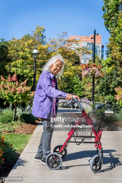 mobility walker - autumn 70 90 stock pictures, royalty-free photos & images