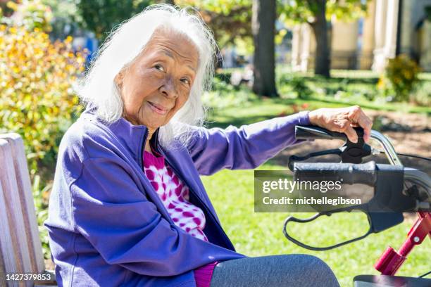 senior elderly filipino woman - autumn 70 90 stock pictures, royalty-free photos & images