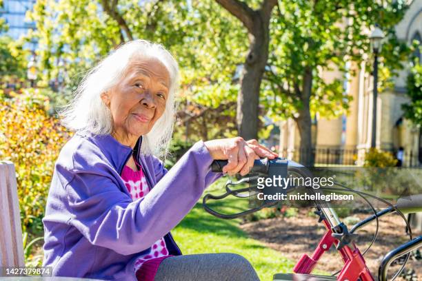 senior elderly filipino woman - autumn 70 90 stock pictures, royalty-free photos & images