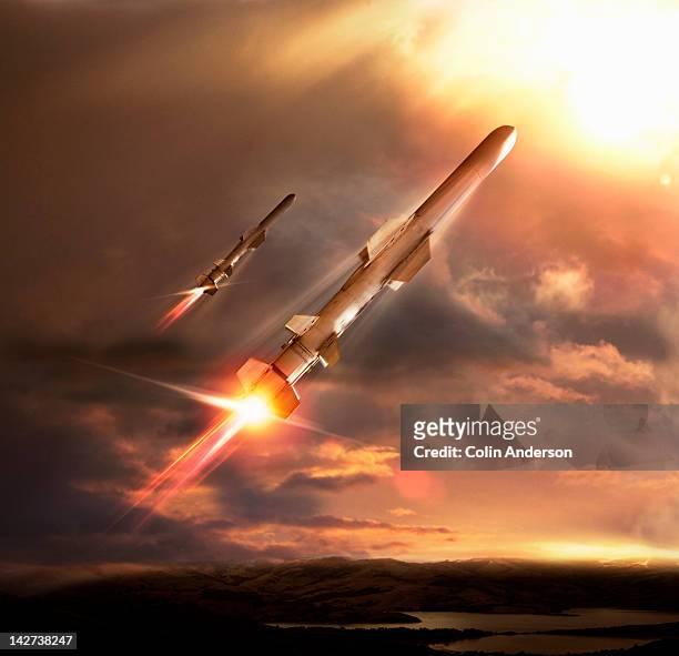 missiles in the sky - ballistic stock-fotos und bilder