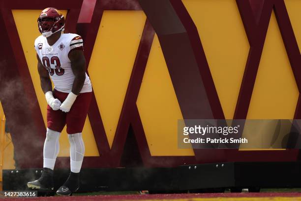 Defensive tackle Jonathan Allen of the Washington Commanders yells during pregame against the Philadelphia Eagles at FedExField on September 25, 2022...