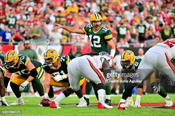 Aaron Rodgers of the Green Bay Packers calls a play against the Tampa Bay Buccaneers during the fourth quarter in the game at Raymond James Stadium...