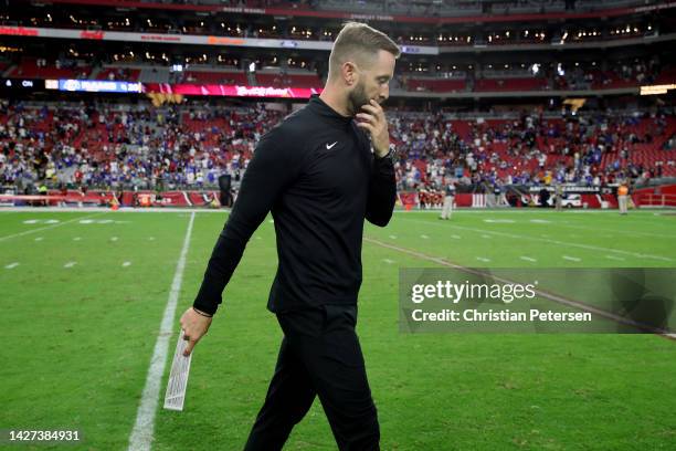 Head coach Kliff Kingsbury of the Arizona Cardinals walks off the field after the game against the Los Angeles Rams at State Farm Stadium on...