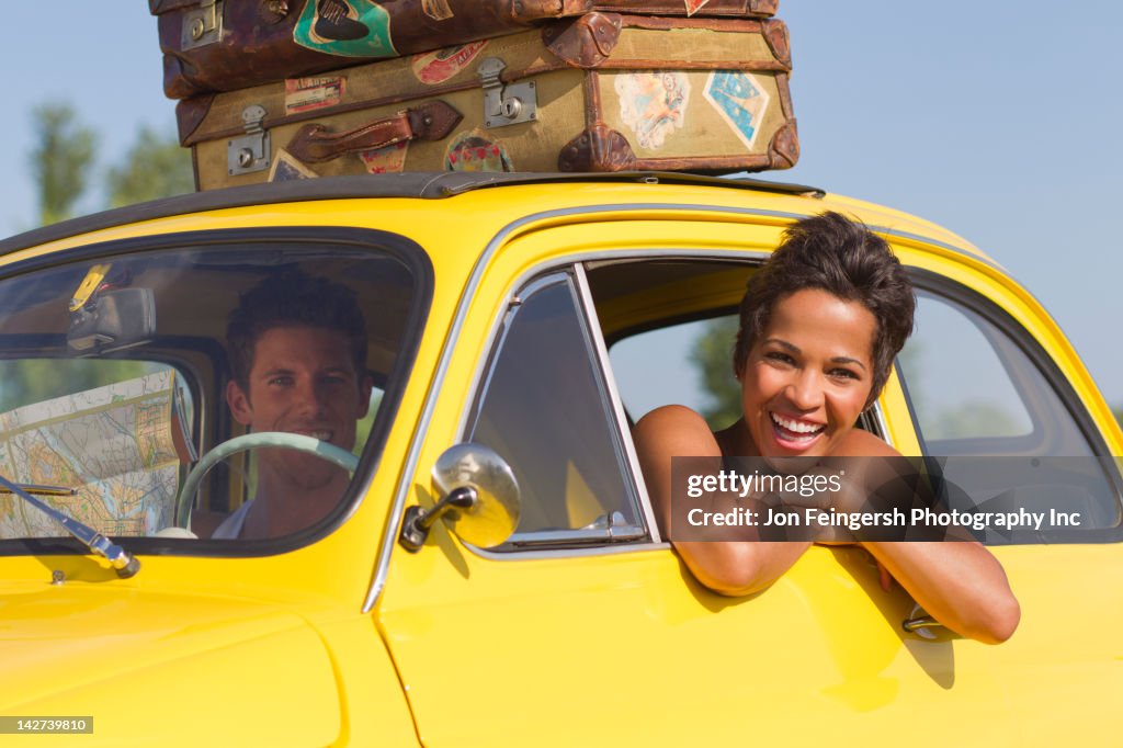 Excited couple on road trip