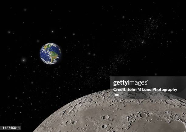 earth and moon in space - medias lunas fotografías e imágenes de stock