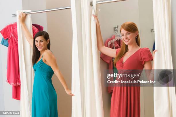 caucasian teenage girls in dressing room - girl changing room shop stock pictures, royalty-free photos & images