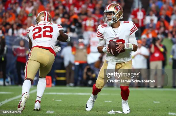 Jimmy Garoppolo of the San Francisco 49ers looks to pass during the first half against the Denver Broncos at Empower Field At Mile High on September...