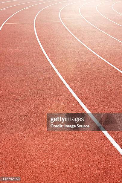 running track - athletics track stock pictures, royalty-free photos & images