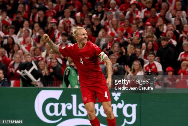 Simon Kjaer of Denmark celebrates the victory with fans following the UEFA Nations League League A Group 1 match between Denmark and France at Parken...