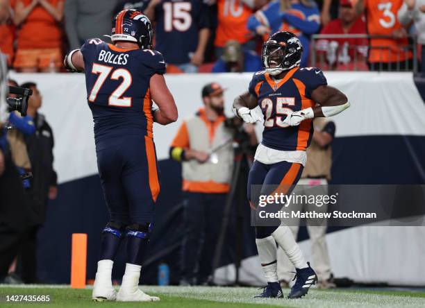 Melvin Gordon III of the Denver Broncos celebrates with teammates after a touchdown during the fourth quarter against the San Francisco 49ers at...