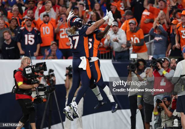 Melvin Gordon III of the Denver Broncos celebrates with teammates after a touchdown during the fourth quarter against the San Francisco 49ers at...