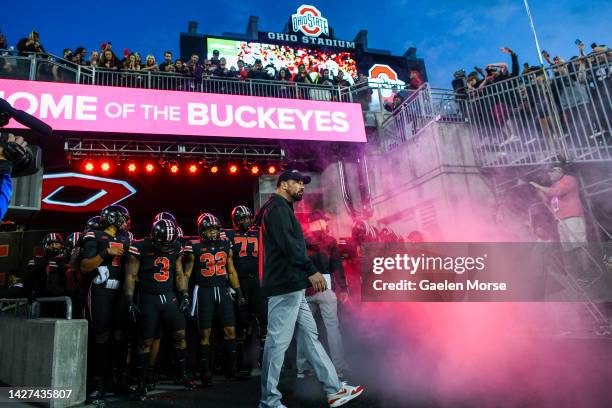 Head coach Ryan Day of the Ohio State Buckeyes prepares to lead the team onto the field before playing the Wisconsin Badgers at Ohio Stadium on...