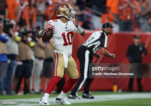 Jimmy Garoppolo of the San Francisco 49ers steps out of the back of the end zone resulting in a safety during the third quarter against the Denver...