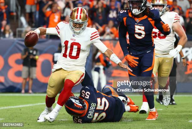 Bradley Chubb of the Denver Broncos sacks Jimmy Garoppolo of the San Francisco 49ers during the fourth quarter of a game at Empower Field At Mile...