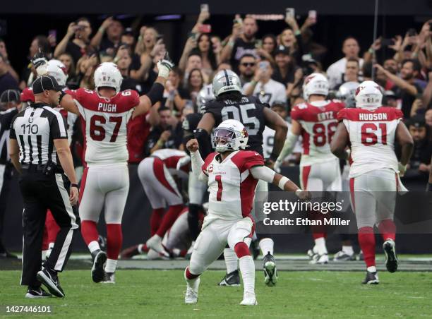 Kyler Murray of the Arizona Cardinals celebrates throwing a two-point conversion with no time left on the clock against the Las Vegas Raiders in the...