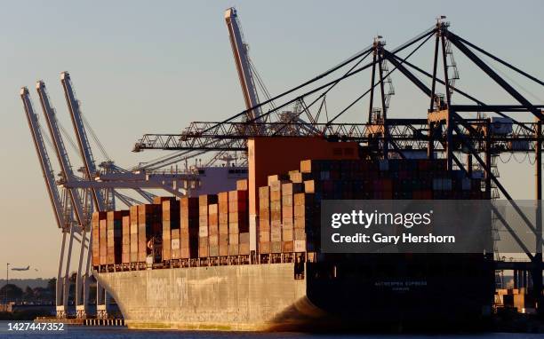 The Hapag-Lloyd Antwerpen Express container ship is unloaded at the GCT container terminal in Jersey City, New Jersey on September 24 as seen from...