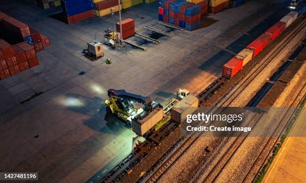 Container Train Loading And Loading Freight Train Loading Photos and Premium High Res Pictures - Getty Images