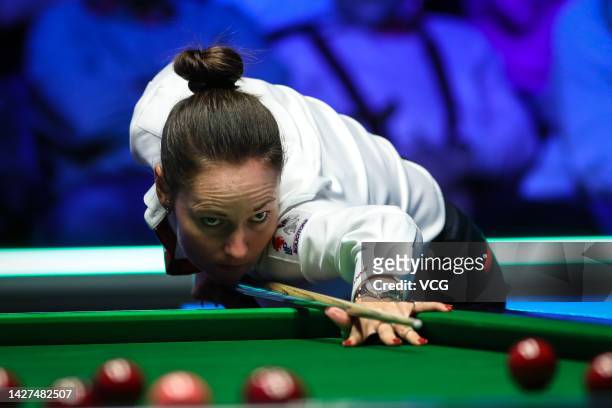 Reanne Evans of England plays a shot in the group match between Mark Selby of England and Rebecca Kenna of England vs Ronnie O'Sullivan of England...