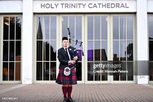 Piper Liam Kernaghan plays during the Auckland service of memorial for Her Majesty Queen Elizabeth II at Holy Trinity Cathedral on September 26, 2022...