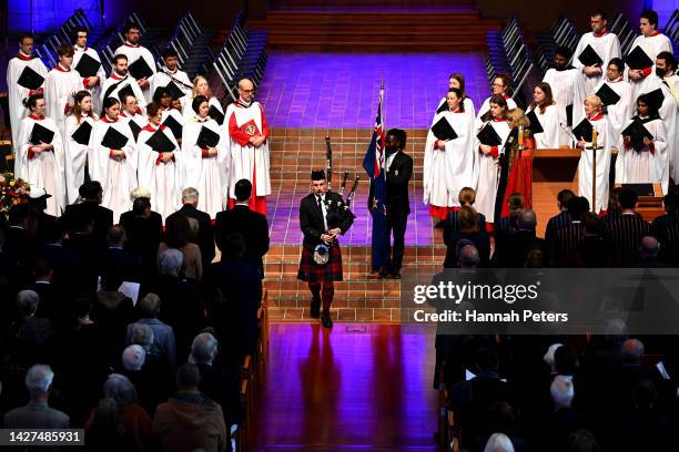 Piper Liam Kernaghan plays during the Auckland service of memorial for Her Majesty Queen Elizabeth II at Holy Trinity Cathedral on September 26, 2022...