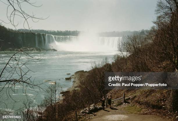 View from the Canadian side of the Niagara River downstream from the Horseshoe Falls waterfall that comprises two thirds of the Niagara Falls between...
