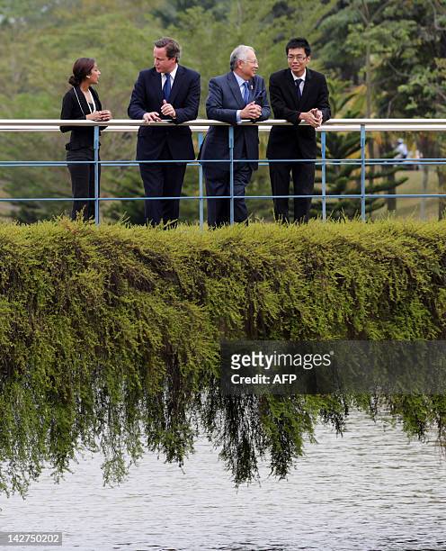 Britain's Prime Minister David Cameron and Malaysia's Prime Minister Najib Razak speak to students during their visit to the University of Nottingham...
