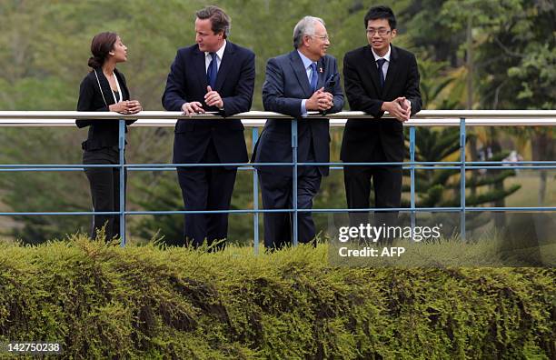 Britain's Prime Minister David Cameron and Malaysia's Prime Minister Najib Razak speak to students during their visit to the University of Nottingham...