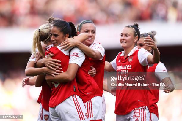 Rafaelle Souza of Arsenal celebrates scoring their team's third goal with teammates during the FA Women's Super League match between Arsenal and...