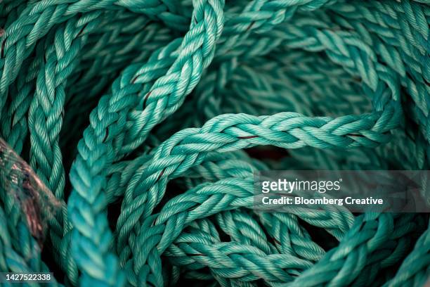 blue rope - creative fishing stock-fotos und bilder