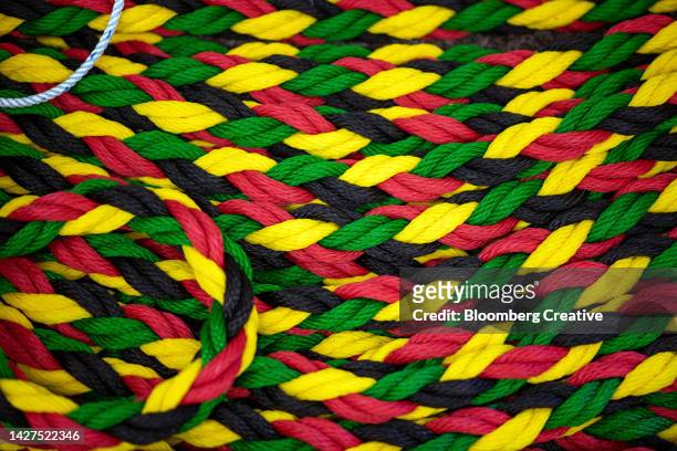 colorful rope in a heap - rope knot stock pictures, royalty-free photos & images