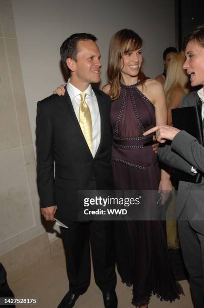 John Campisi, left, and actress Hilary Swank attend the Metropolitan Museum of Art's annual Costume Institute gala in New York City. Swank wears...