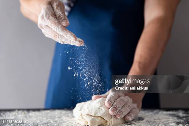 preparing bread dough - kneading stock pictures, royalty-free photos & images