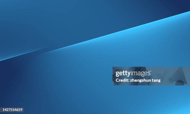 abstract blue inclined plane shaped stacking under lights. - inclinado fotografías e imágenes de stock