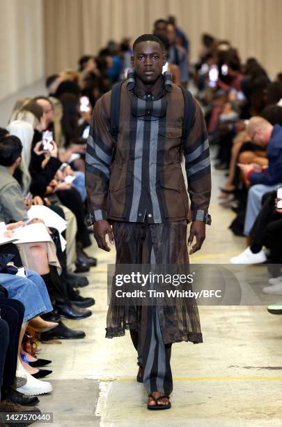 Model walks the runway at the Burberry show during London Fashion Week September 2022 on September 26, 2022 in London, England.