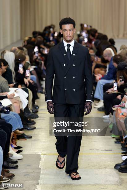 Model walks the runway at the Burberry show during London Fashion Week September 2022 on September 26, 2022 in London, England.