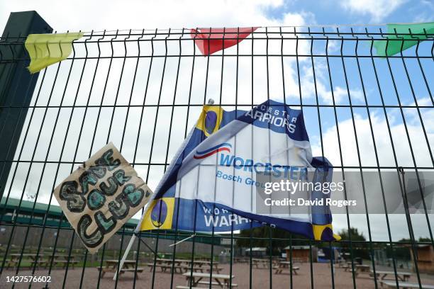 Flags and posters, showing fans support for the team, on the gates of the Sixways Stadium, home of Worcester Warriors, on September 26, 2022 in...