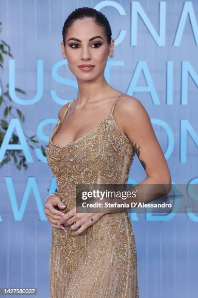 Giulia De Lellis attends the CNMI Sustainable Fashion Awards 2022 pink carpet during the Milan Fashion Week Womenswear Spring/Summer 2023 on...