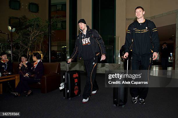 Rihards Kuksiks, #30 and Serhiy Lishchuk, #12 of Valencia Basket arrive to Novotel Sheremetievo during the Eurocup Basketball Finals 2012 on April...